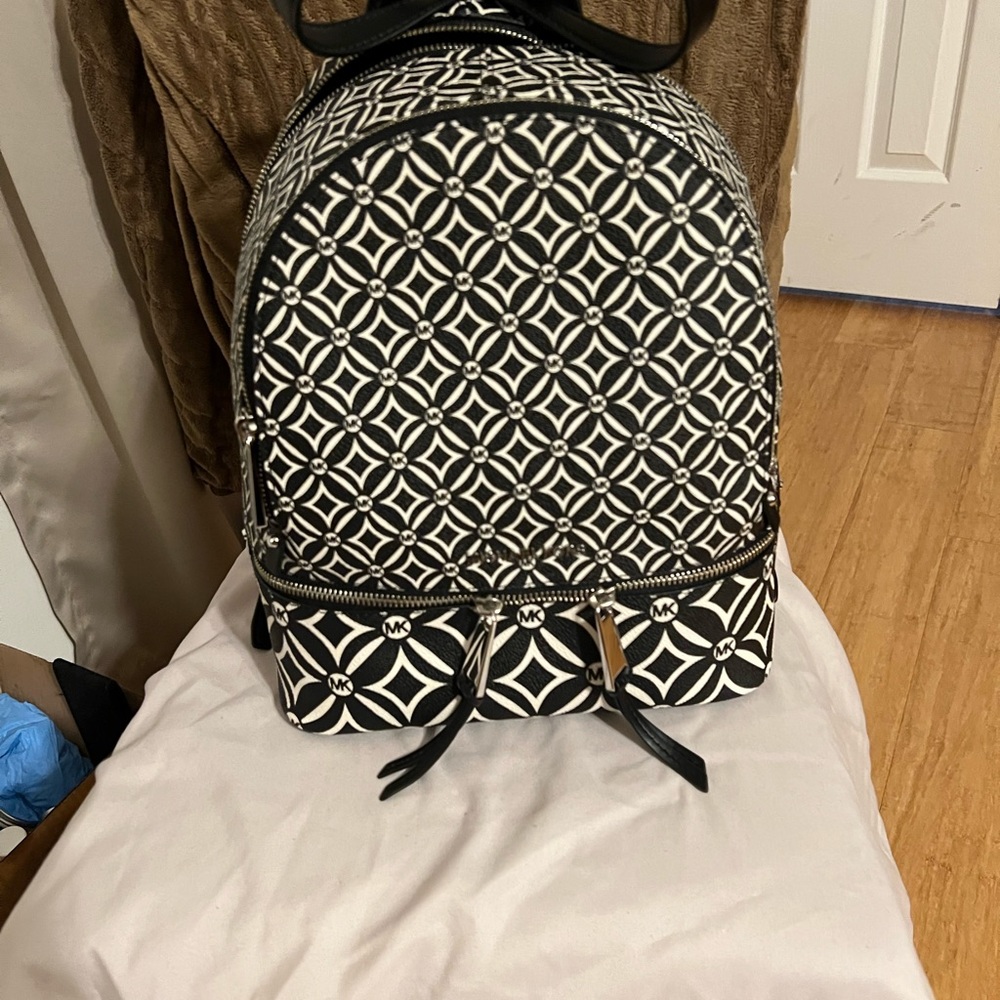 Michael Kors Backpack 9 1/2”W X 12 1/2”H X 2 1/2”D